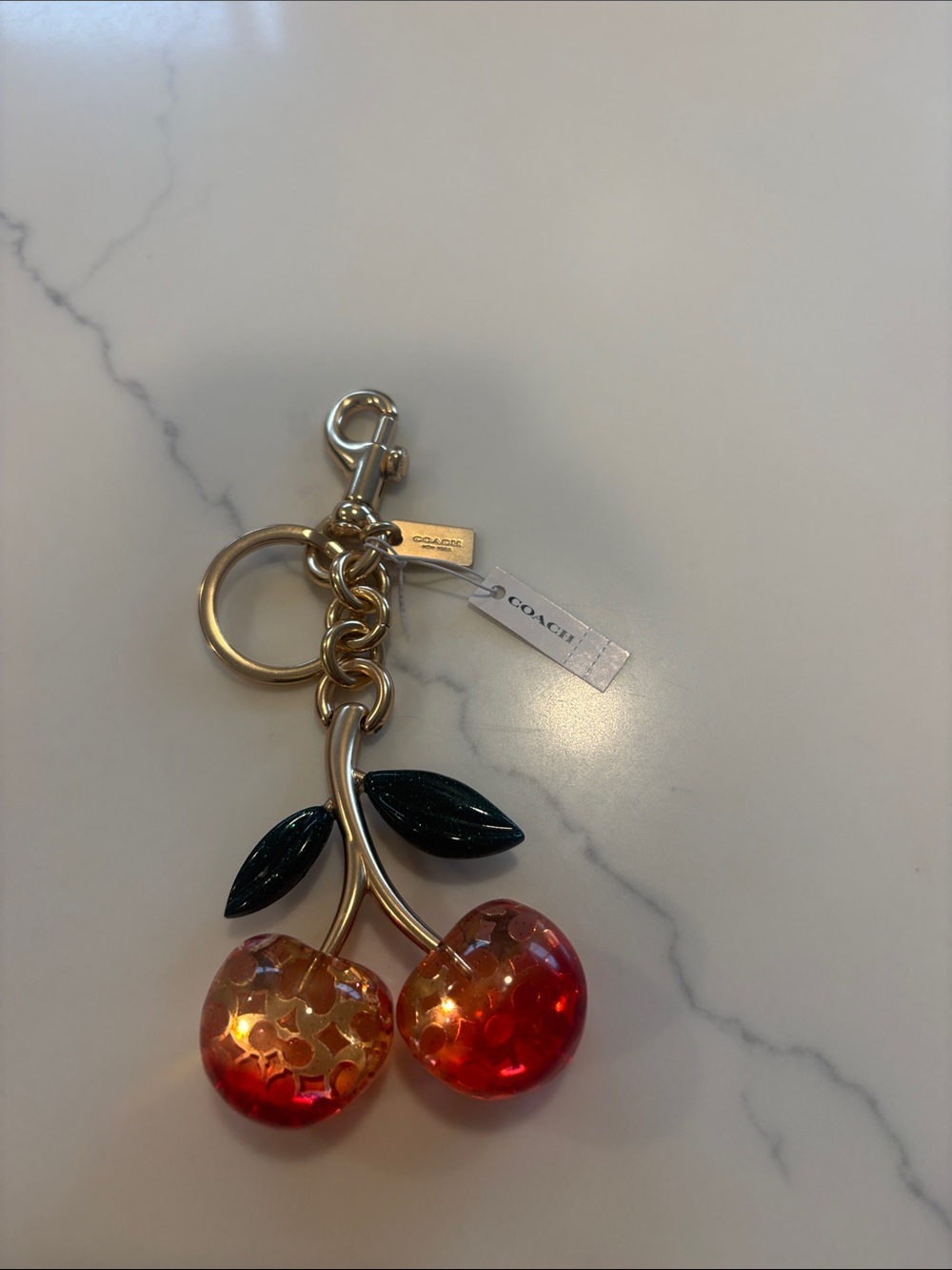 COACH Gold-Tone Cherry Key & Card Holder with Red Cherries and Dark Green Leaves